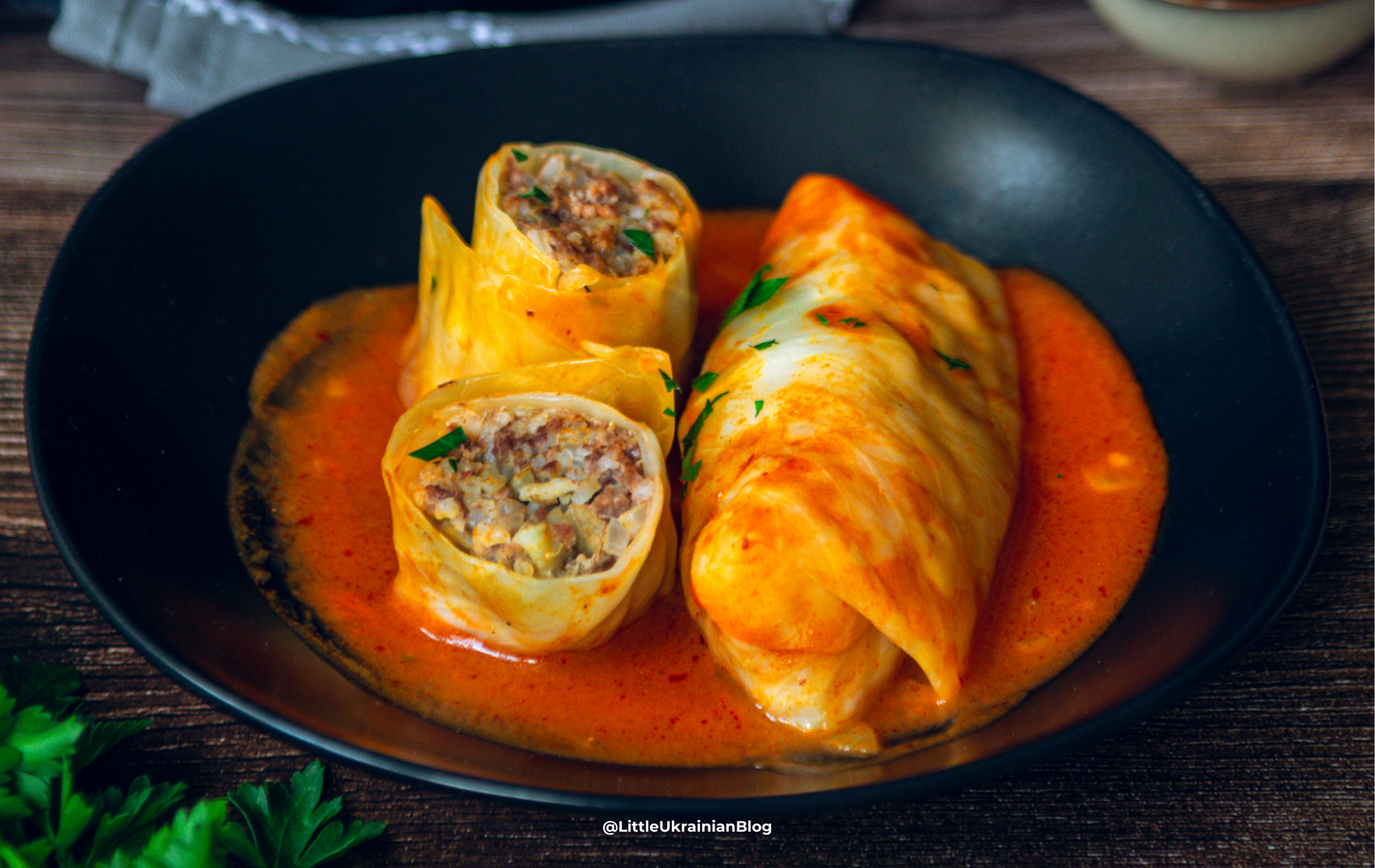 Holubtsi (Stuffed Cabbage Rolls) English: Vegetarian Ukrainian holubtsi made with rice and mushrooms, served with tomato sauce, a classic autumn dish. Ukrainian: Вегетаріанські українські голубці з рисом та грибами, подані з томатним соусом, класична осіння страва. Ukrainian autumn dishes. Ukrainian autumn food.