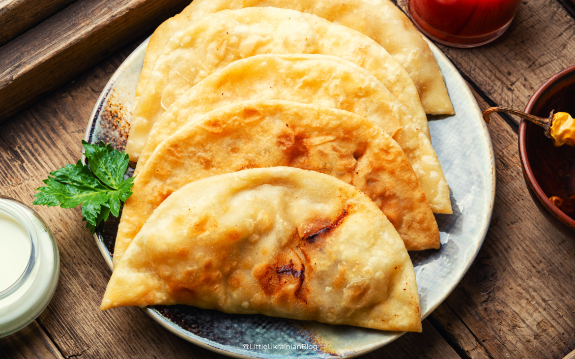 Traditional Crimean Tatar çibörek (чебурек), a crispy fried pastry filled with minced meat and onions from Crimea, featured in Traditional Ukrainian Dishes by Region.